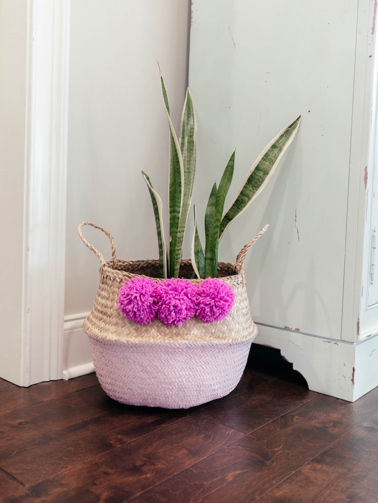 Pink Seagrass Belly Basket with fuchsia pom poms