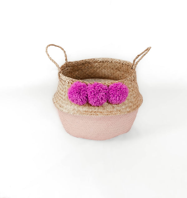 Pink Seagrass Belly Basket with fuchsia pom poms