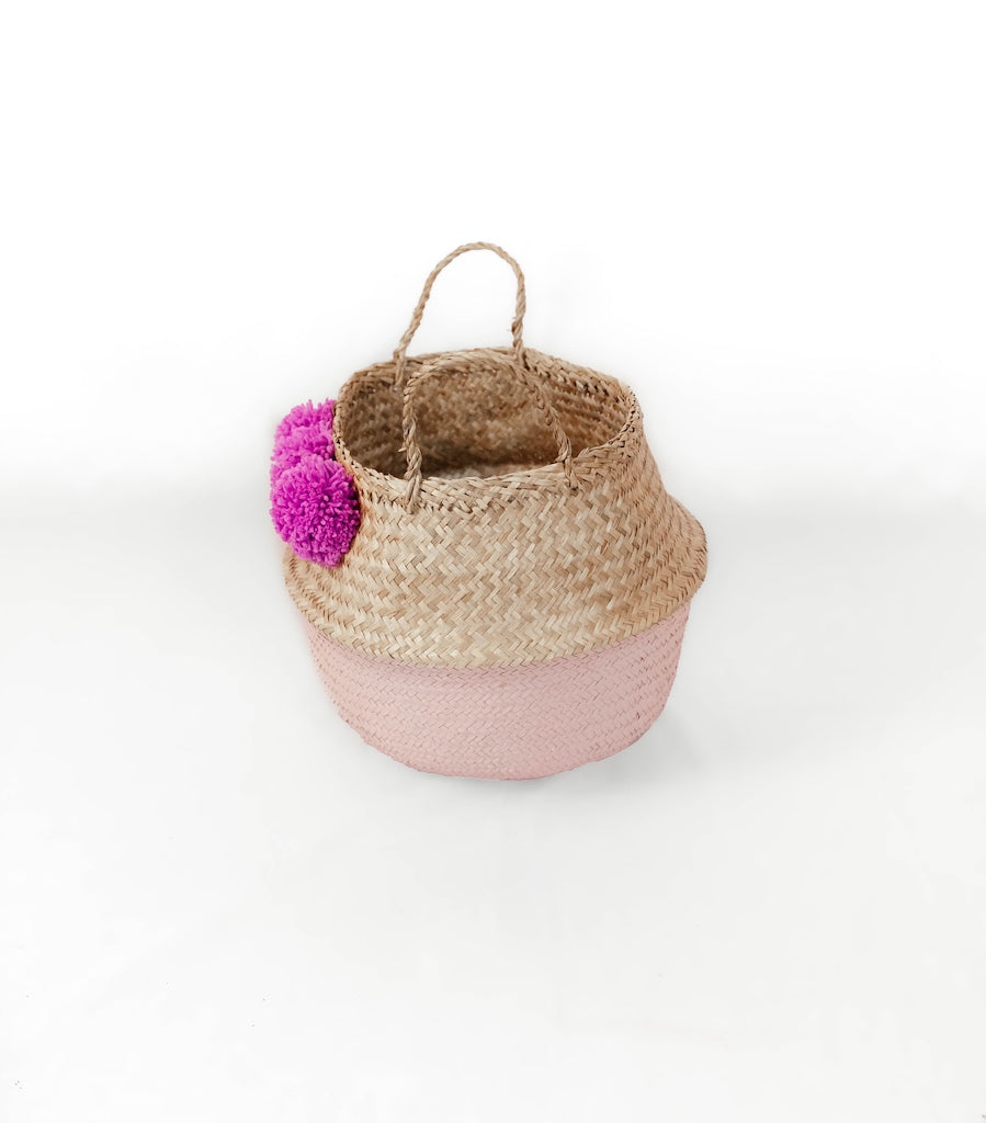 Pink Seagrass Belly Basket with fuchsia pom poms