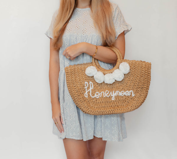 Straw Woven Honeymoon Bag with white Pom poms Summer wedding bag